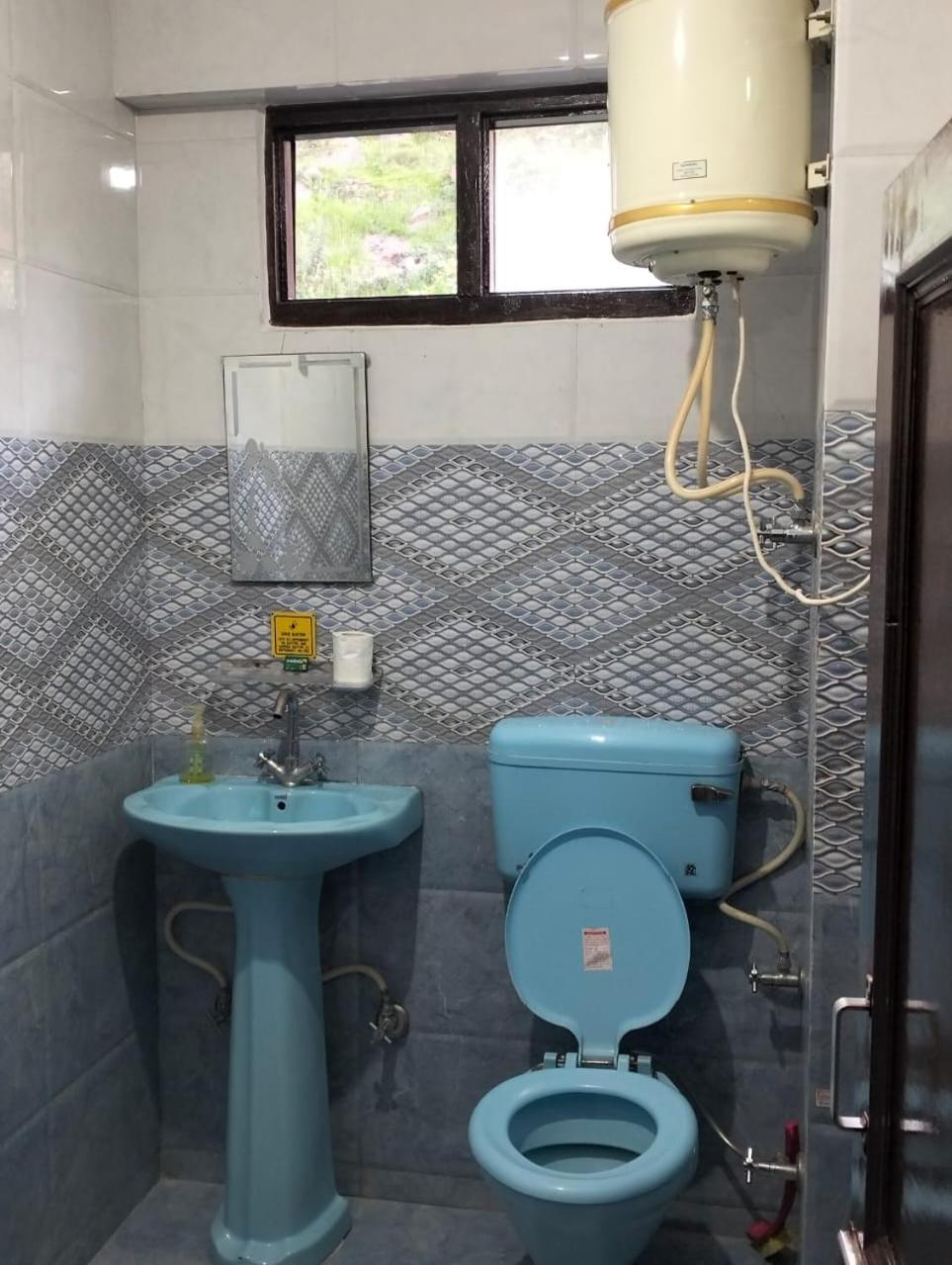 Aman Inn Dharamshala Esterno foto